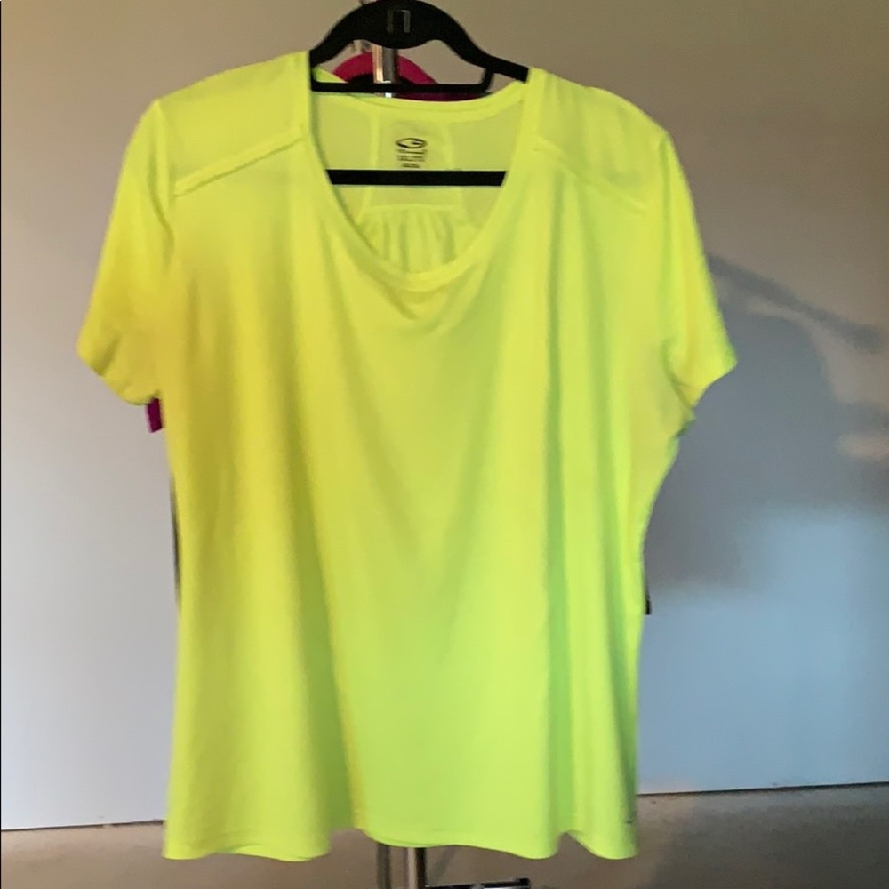 Bright workout tee with mesh shoulder panels